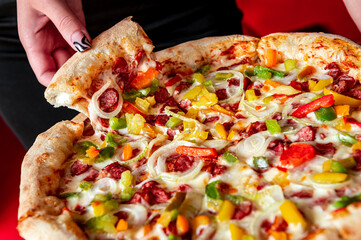 Tasty and big pizza with different types of meat