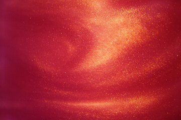 abstract red background with sparkles liquid waves and motion