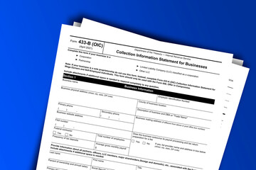 Fototapeta premium Form 433-B (OIC) documentation published IRS USA 04.25.2021. American tax document on colored