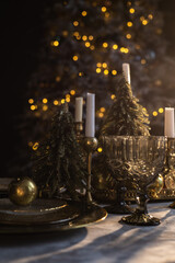 Beautiful table setting with Christmas decorations in living room