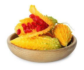 Wooden bowl with fresh ripe bitter melons on white background