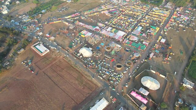 jath maharashtra india festival vibes in villages night bird eye view drone shot ferris wheels Yellamma Yatra at Jath in Sangli in Maharashtra