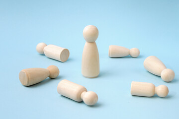 Winner eliminating competitors, winning, victory, success and surviving concept. Wooden figurines....