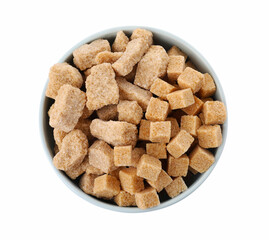 Bowl with cubes and chunks of brown sugar isolated on white, top view