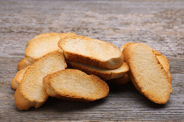 Tasty hard chuck crackers on wooden table