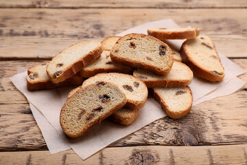 Sweet hard chuck crackers with raisins on wooden table