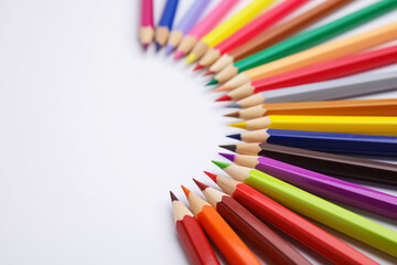 Colorful wooden pencils on white background, closeup. Space for text