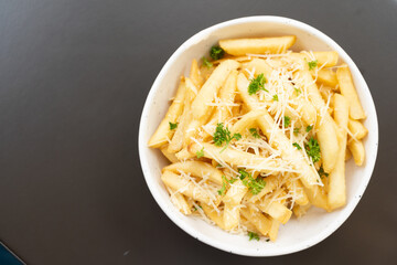French fries. potato chips. Bowl with fresh cooked french fries potato chips. appetizing. copy space for text.