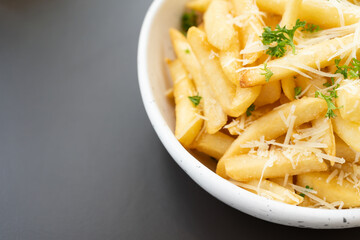 French fries. potato chips. Bowl with fresh cooked french fries potato chips. appetizing. copy space for text.