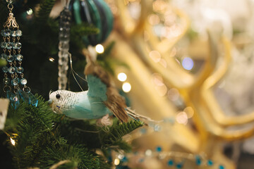 Christmas toys on the original Christmas tree decorated for the New year and Christmas at home