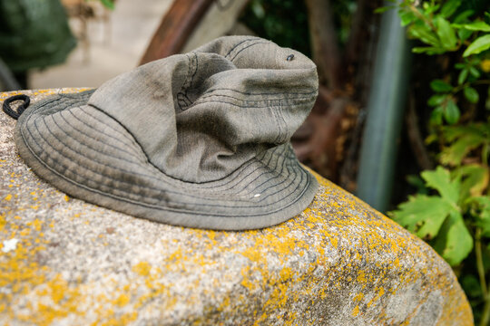 Old crumpled hat on rock