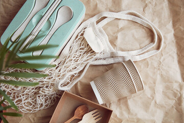 Natural, eco-friendly, plastic free, zero waste tableware. Eco shopping bag on crumpled paper....