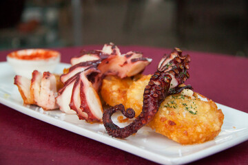 OCTOPUS LEG AND POTATOES