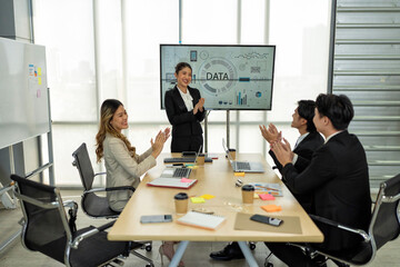 Employee meeting big screen tv presentation conference discussion brainstorming and working together