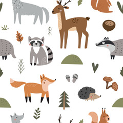 Seamless pattern of cute woodland animals and birds with natural elements. Vector illustration for nursery and textile decoration