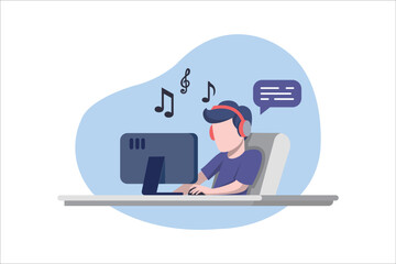 The programmer works at home at the computer listening music wearing headphones