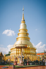 Naklejka premium The golden pagoda, Lamphun, Thailand