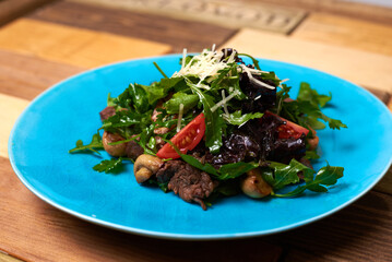 salad of meat, mushrooms and vegetables