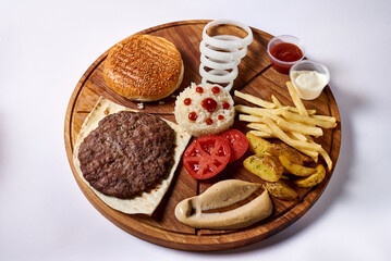 disassembled hamburger, on a wooden tray, on a white background