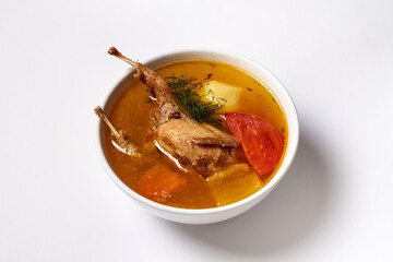 quail soup on a white background