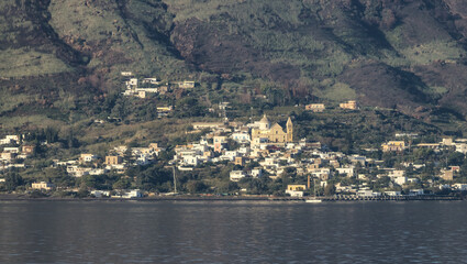 Stromboli Island with an Active Volcano in Tyrrhenian Sea. Italy. Sunny Morning Sunrise Sky. Nature Background