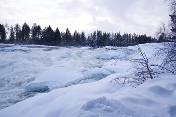 Fototapeta na wymiar waterfall Storforsen in the winter, Sweden