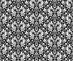 Wallpaper in the style of Baroque. Seamless vector background. White and black floral ornament. Graphic pattern for fabric, wallpaper, packaging. Ornate Damask flower ornament