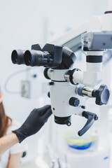 Dental microscope in a modern dental office. Modern dental treatment.