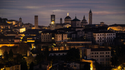 Bergamo. One of the beautiful city in Italy. Landscape at the old town from the hill at evening. Amazing view of the towers, bell towers and main churches. Touristic destination. Best of Italy