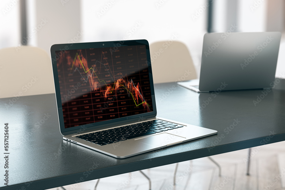 Aufkleber close up of laptop with falling red index candlestick graph on screen. blurry background. crisis, ma