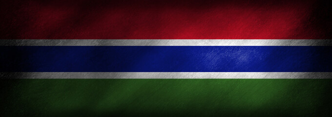 Fototapeta premium The flag of Gambia on a retro background