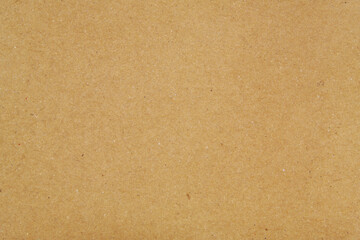 Brown shipping carton close up as background