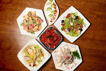 salads top view, on a wooden background