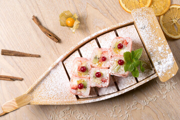 japanese sushi, rolls on a wooden structure