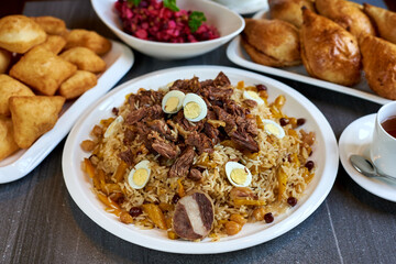 pilaf, with lamb meat, and quail egg