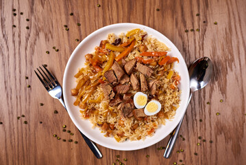 pilaf, with lamb meat, and quail egg