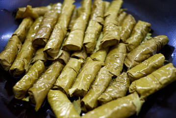 cabbage rolls wrapped in grape leaves