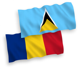 National vector fabric wave flags of Romania and Saint Lucia isolated on white background. 1 to 2 proportion.