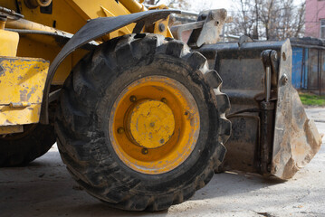 Fototapeta na wymiar in the mud bucket excavator loader