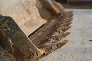 in the mud bucket excavator loader