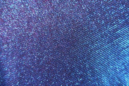 View of shiny purplish blue lurex fabric from above