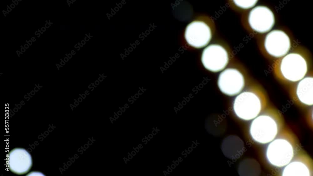Wall mural abstract light dot background. white and yellow glowing light stripes moving diagonally on dark back