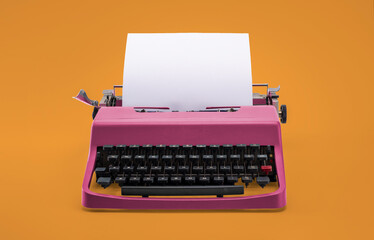 Vintage typewriter with blank paper. Pop colors.