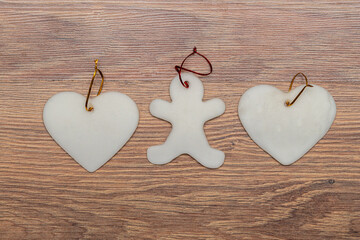 sugar Christmas tree ornaments on a wooden background