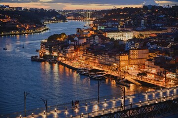 View of Porto at night. View of the Ponte de D. Luís I bridge. Bridges in Porto. River Douro. 