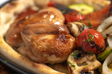close up of  fried chicken with vegetables