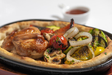 close up of  fried chicken with vegetables