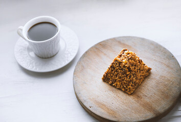 close up of home cooked cake and cup of coffee