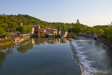 Fototapeta na wymiar Traditional watermills in Borghetto of Valeggio sul Mincio, Verona province, Italy