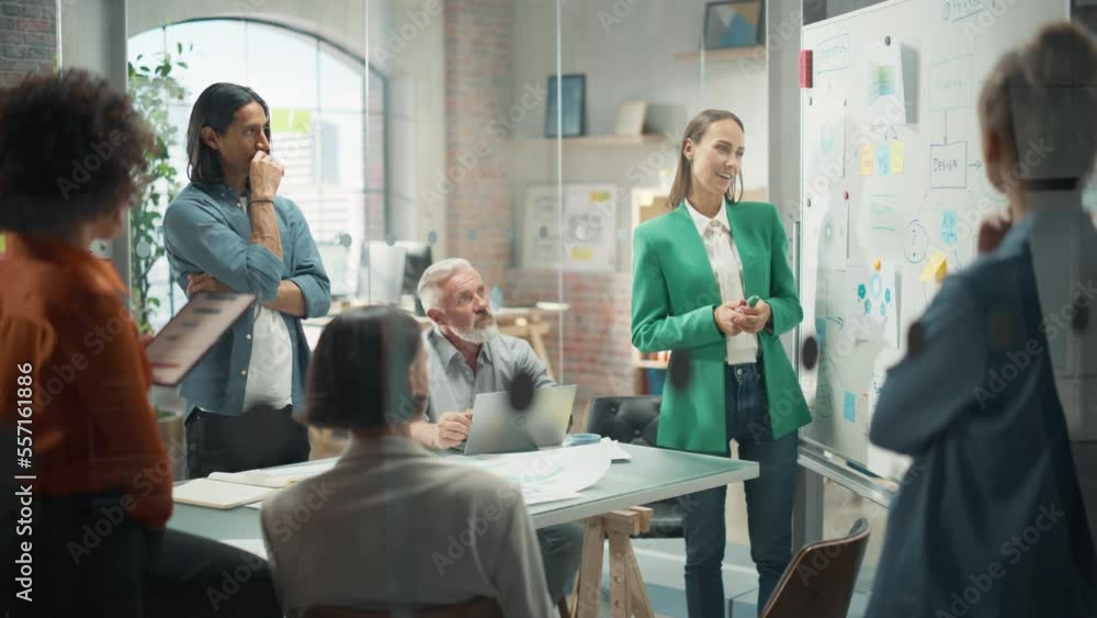 Poster female project manager makes a presentation for a diverse creative team in meeting room in an agency